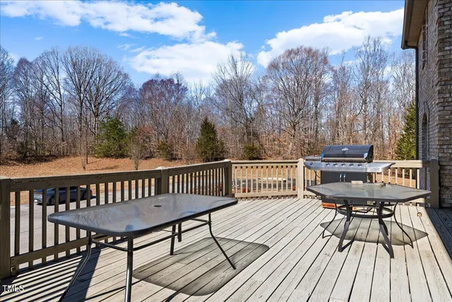 a bathroom with a toilet a sink and tub
