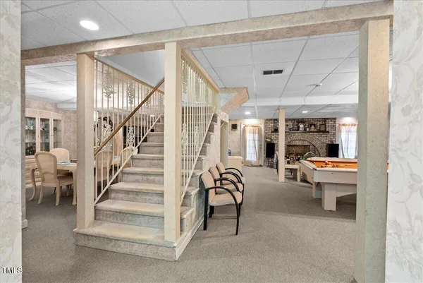 a bedroom with a bed and a table