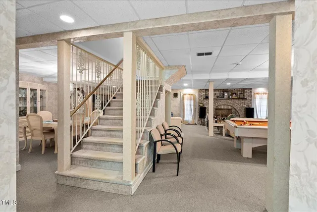 a bedroom with a bed and a table