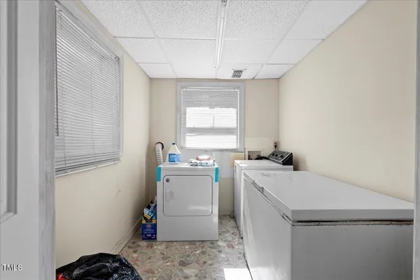 a bedroom with a bed and a walk in closet