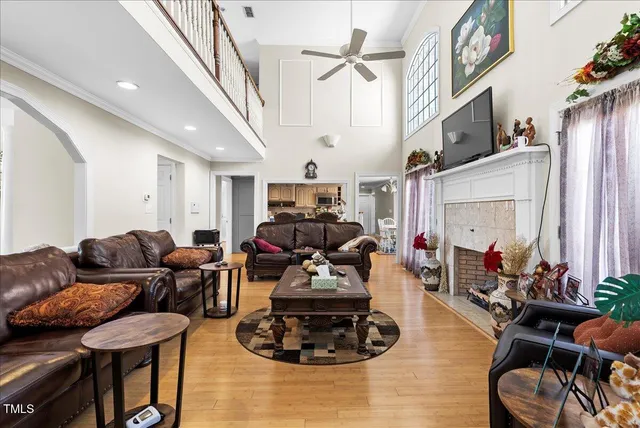 a view of a deck with table and chairs and wooden floor