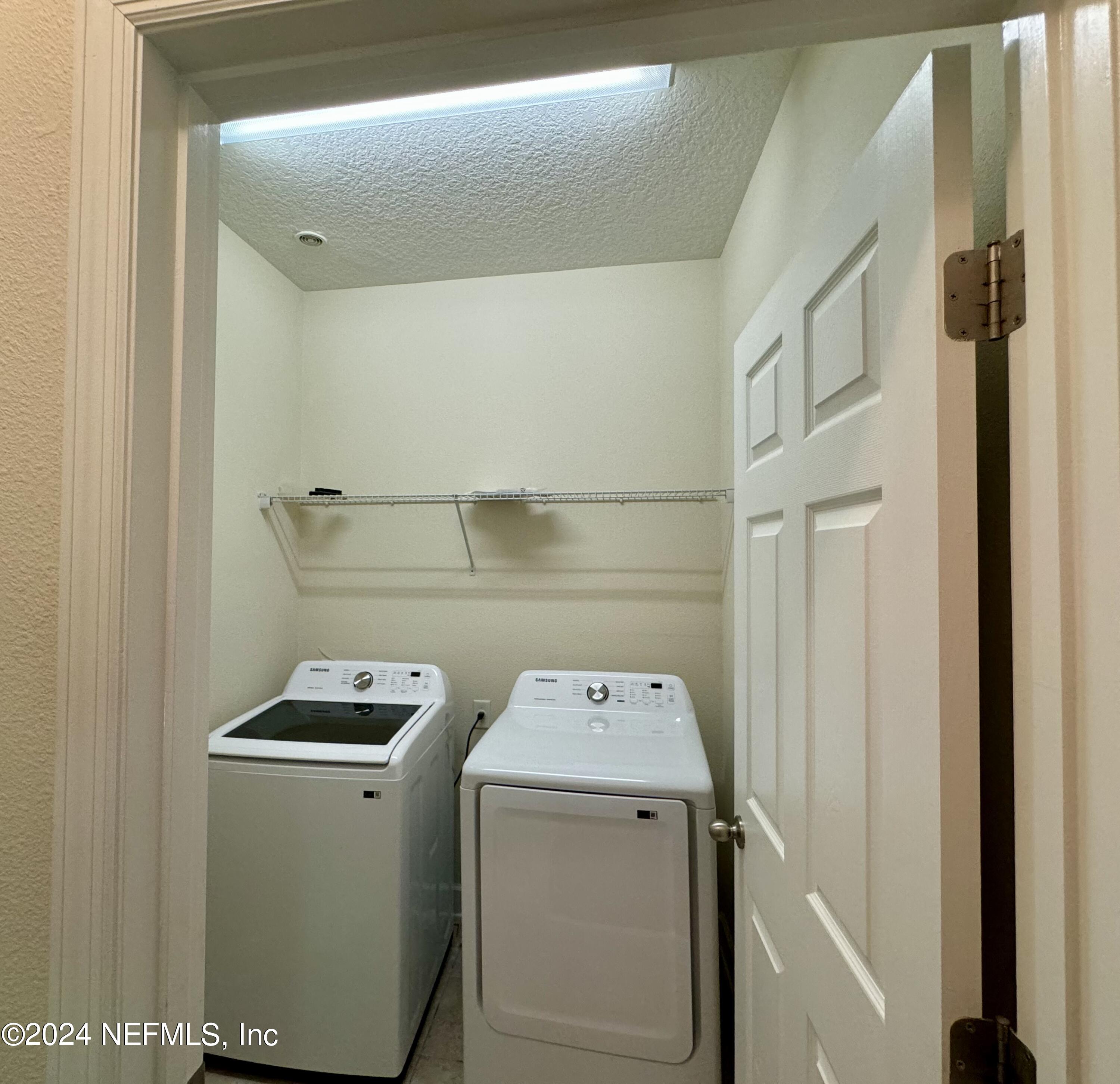 289 Spring Park Avenue Ponte Vedra, FL 32081 - Photo 10 of 19 a utility room with dryer and washer