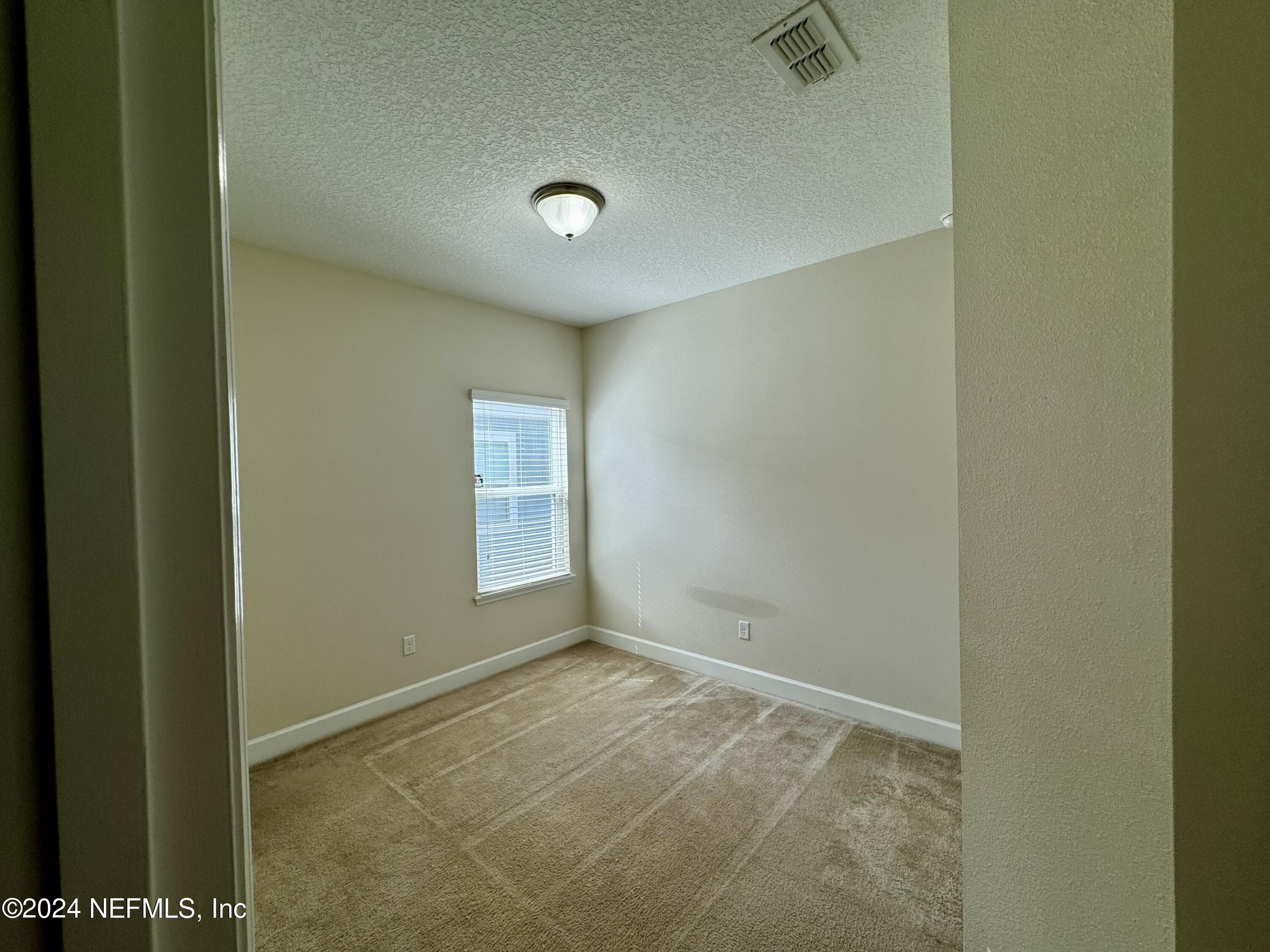 289 Spring Park Avenue Ponte Vedra, FL 32081 - Photo 11 of 19 a view of an empty room