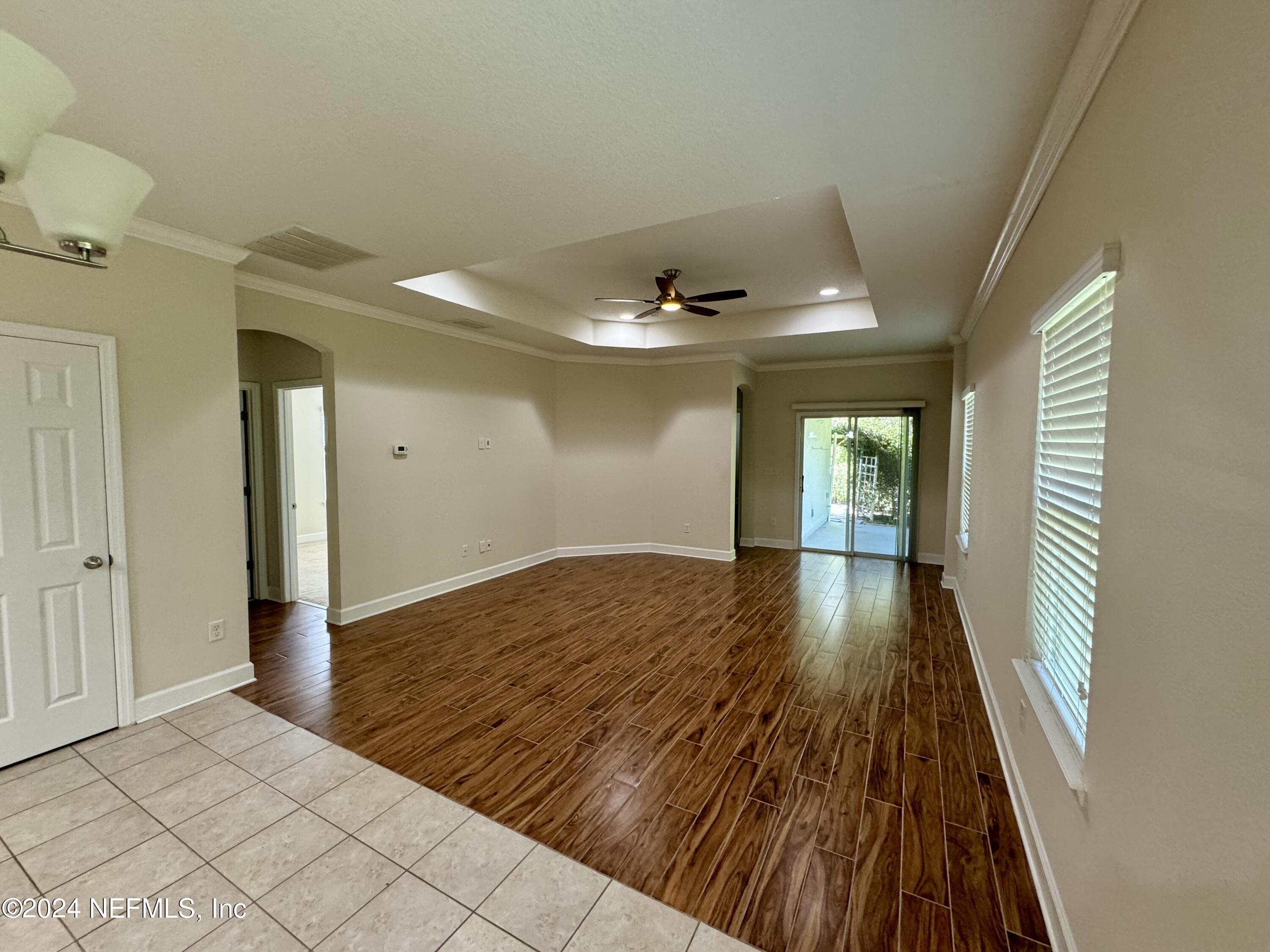 289 Spring Park Avenue Ponte Vedra, FL 32081 - Photo 5 of 19 a view of a room with wooden floor and window
