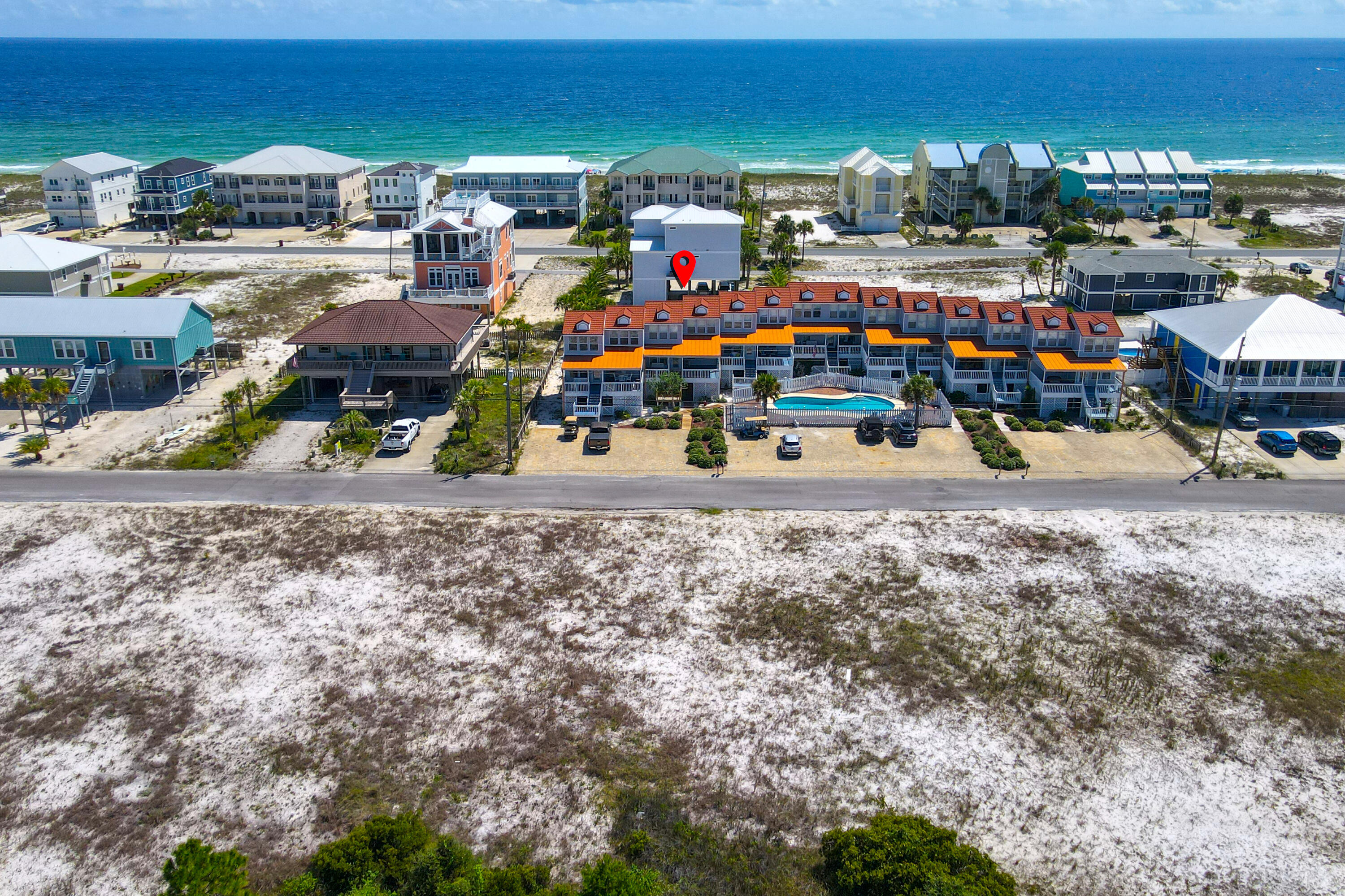 7905 White Sands Boulevard, Unit 2 Navarre, FL 32566 - Photo 3 of 51 a view of parking space with city view