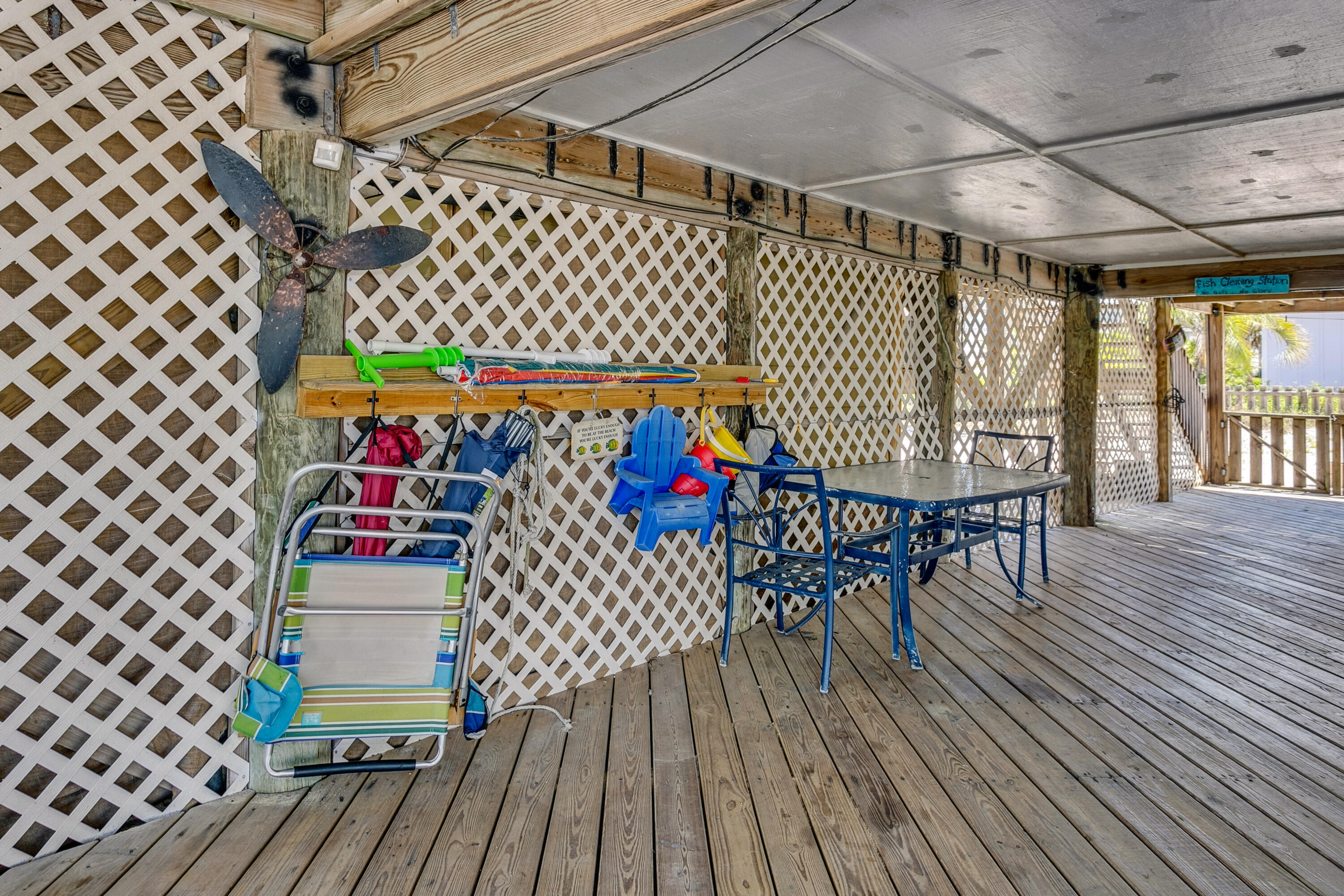 7905 White Sands Boulevard, Unit 2 Navarre, FL 32566 - Photo 34 of 51 a view of outdoor seating