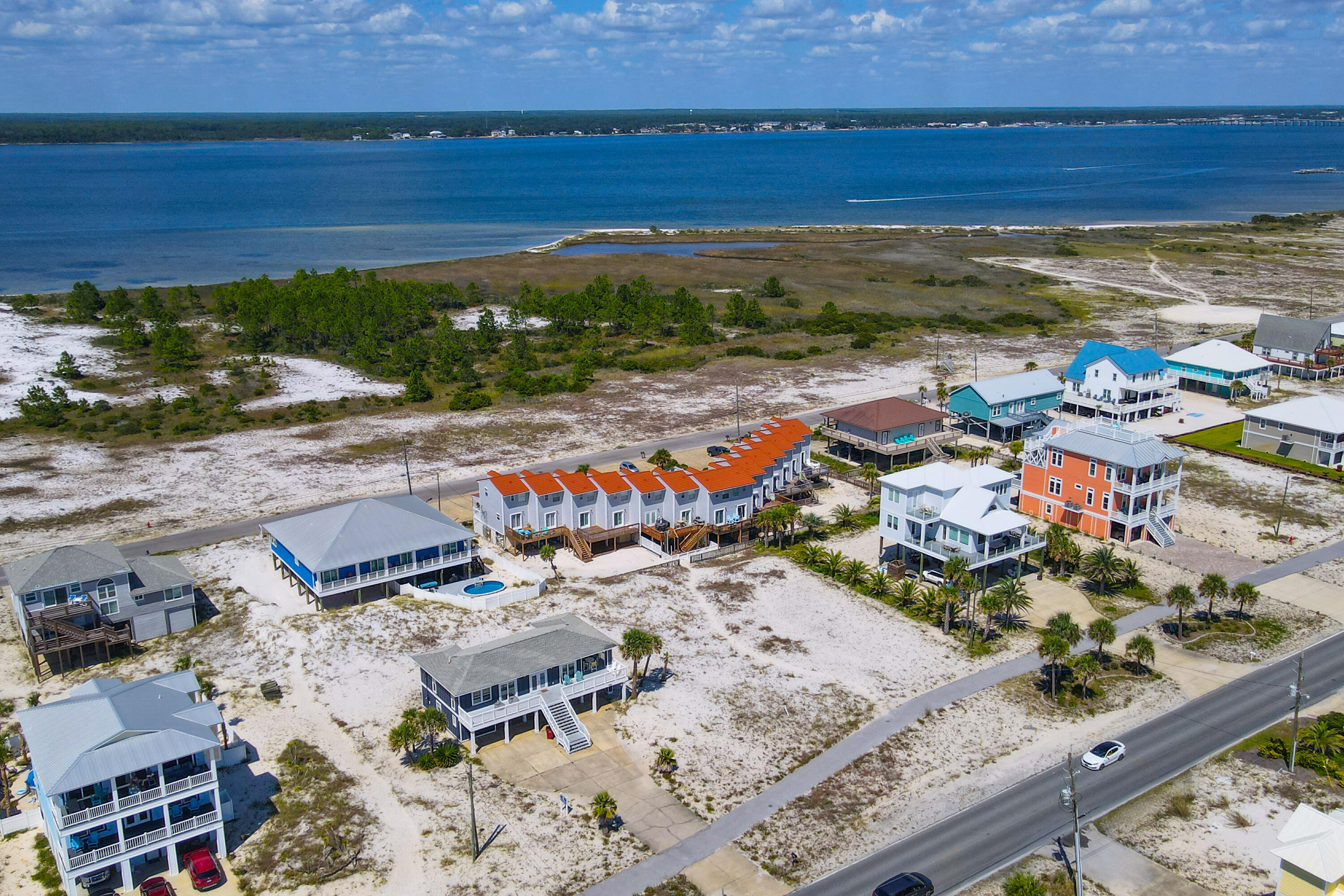 7905 White Sands Boulevard, Unit 2 Navarre, FL 32566 - Photo 44 of 51 a view of a city with an ocean view