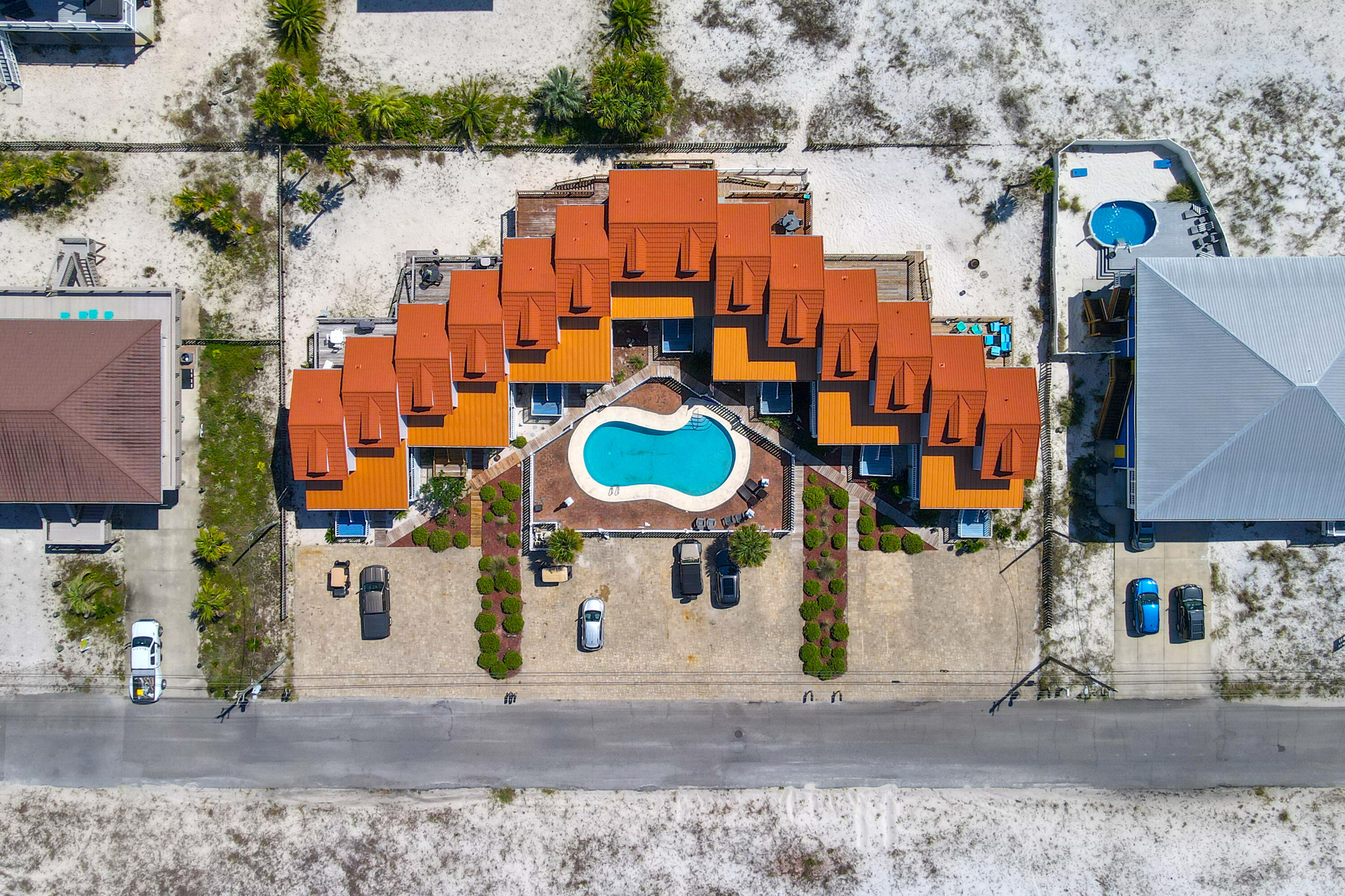 7905 White Sands Boulevard, Unit 2 Navarre, FL 32566 - Photo 6 of 51 an aerial view of a swimming pool