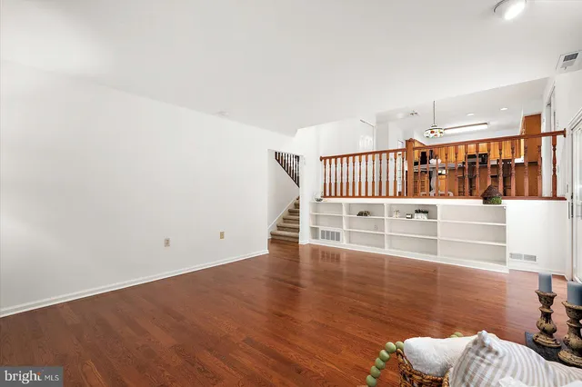 a view of balcony with deck and wooden floor