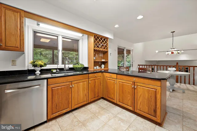 a view of deck with wooden floor and fence