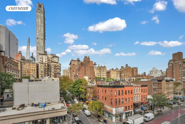 a bathroom with a shower sink and mirror