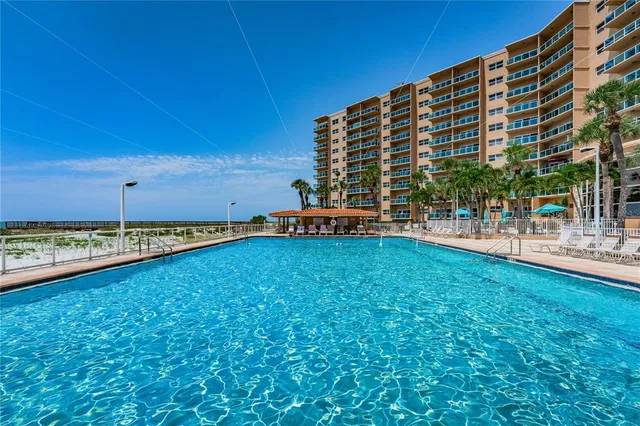 a tall building with a yard