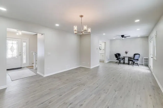a view of a livingroom with a furniture wooden floor