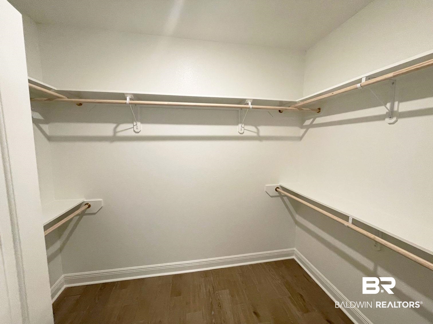 1339 Fenton Circle Foley, AL 36535 - Photo 10 of 17 Walk in closet with dark wood-style floors