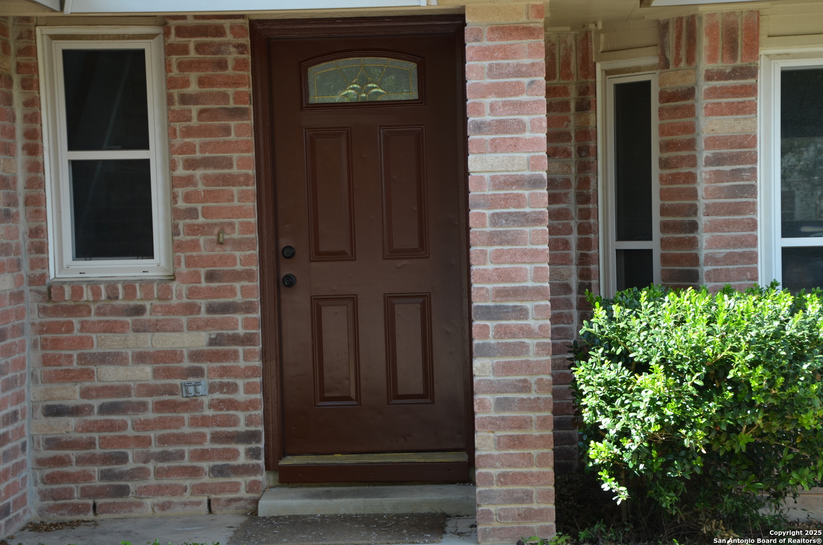 5955 Spring Crossing San Antonio, TX 78247 - Photo 2 of 17 a view of front door of house