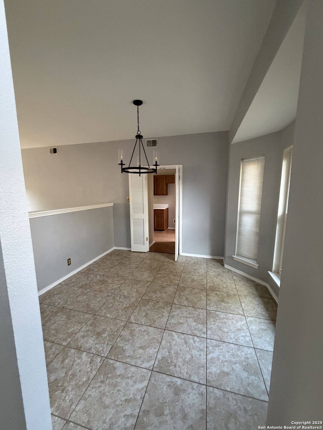 5955 Spring Crossing San Antonio, TX 78247 - Photo 5 of 17 a view of empty room with windows
