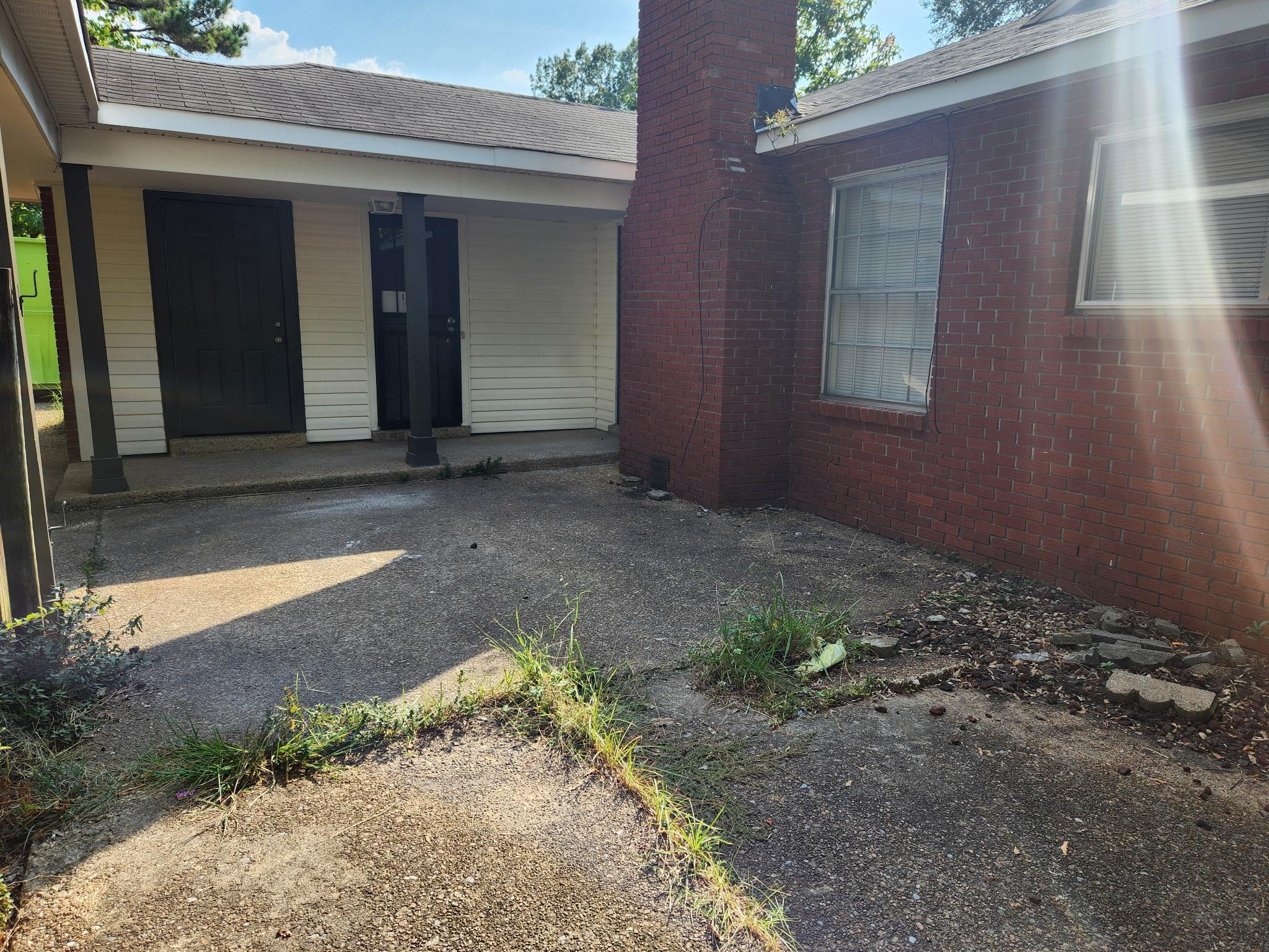 3446 Fox Meadows Road Memphis, TN 38115 - Photo 6 of 22 a view of a house with a backyard