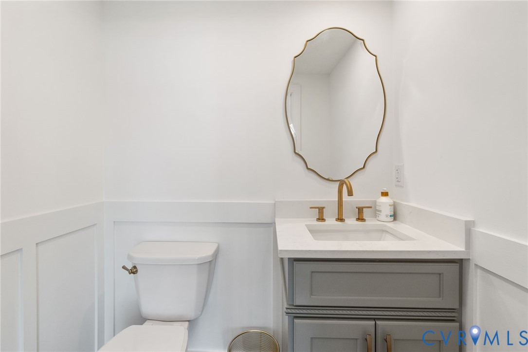 189 Old Buckingham Road Cumberland, VA 23040 - Photo 12 of 50 a bathroom with a sink a toilet and a mirror