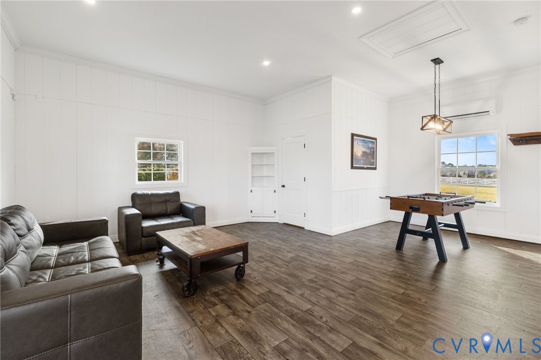 189 Old Buckingham Road Cumberland, VA 23040 - Photo 32 of 50 a living room with furniture and a wooden floor