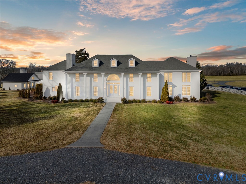 189 Old Buckingham Road Cumberland, VA 23040 - Photo 4 of 50 a front view of a house with a yard