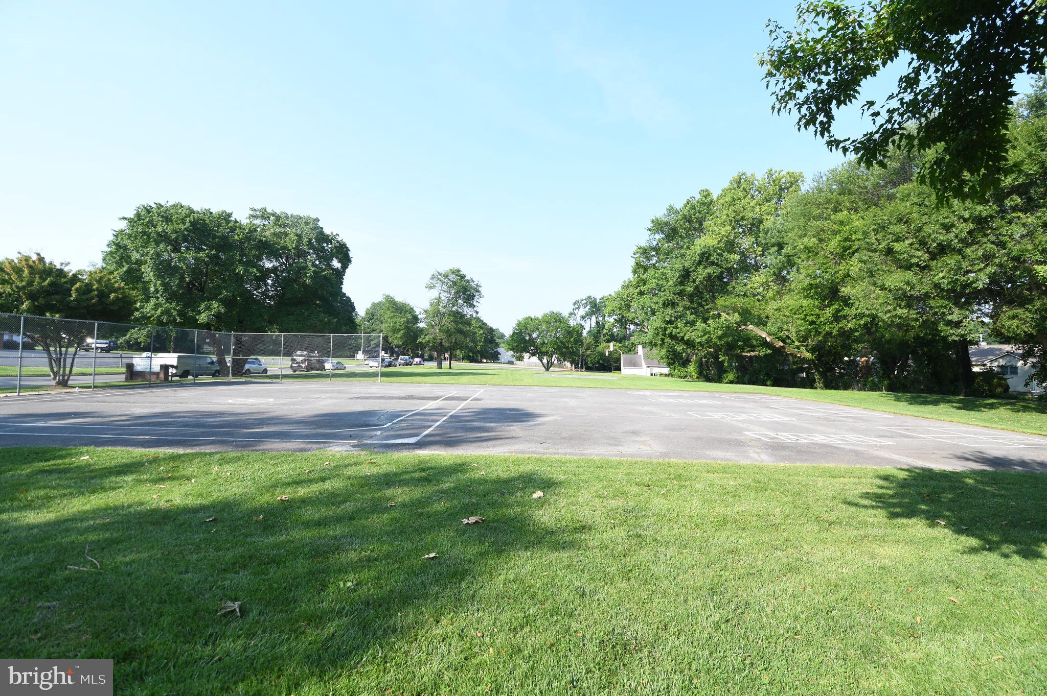 111 Spring Street Gaithersburg, MD 20877 - Photo 10 of 11 a view of outdoor space with garden and trees