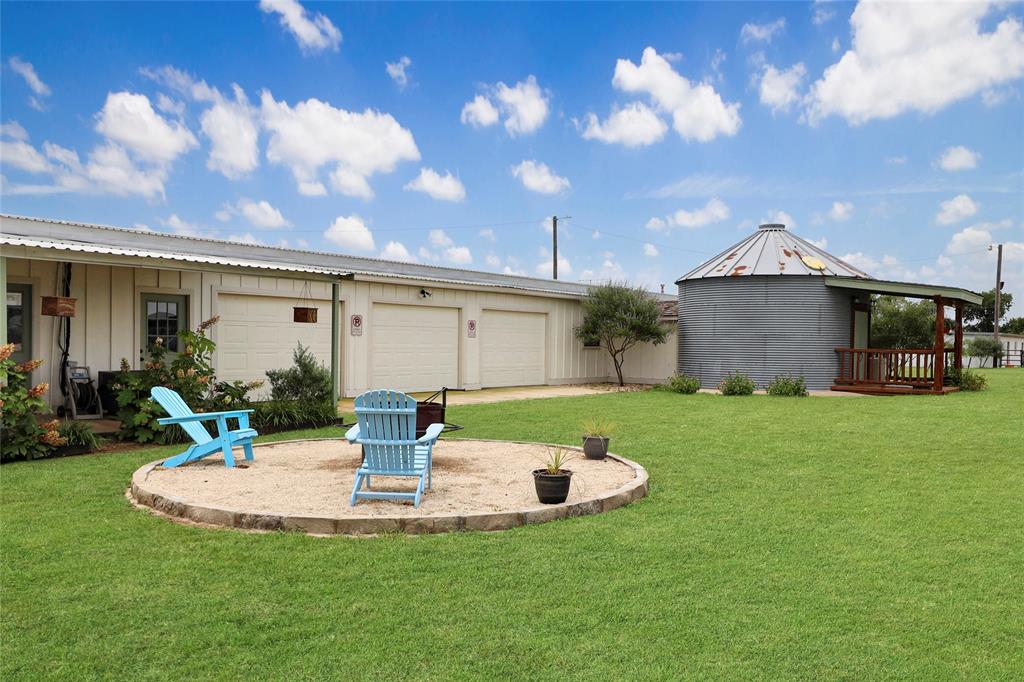 2408 Strader Road DISH, TX 76247 - Photo 5 of 40 a view of a house with backyard and sitting area
