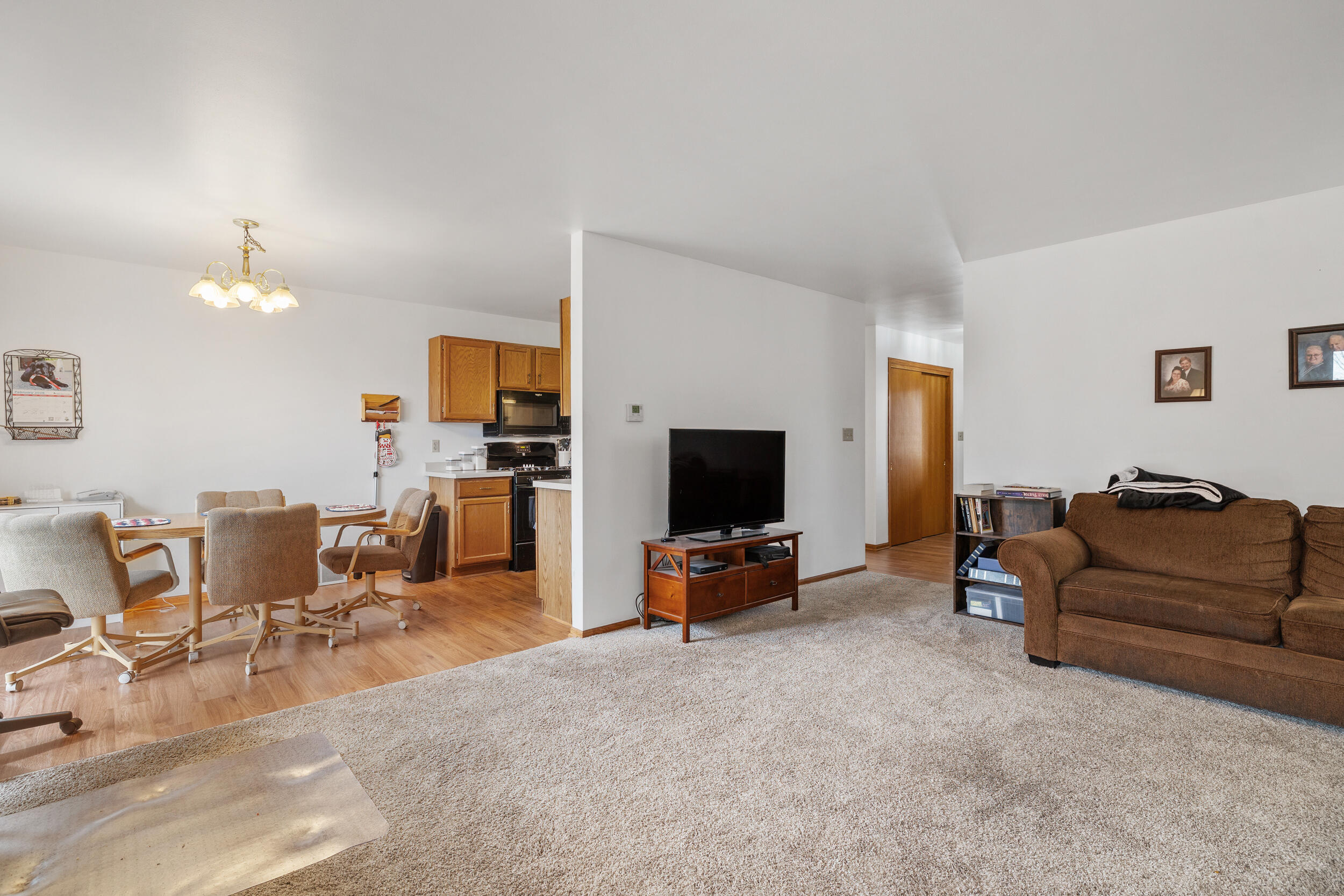 1105 Linden Street, Unit 1107 Cleveland, WI 53015 - Photo 29 of 47 1107 Living room to dining room