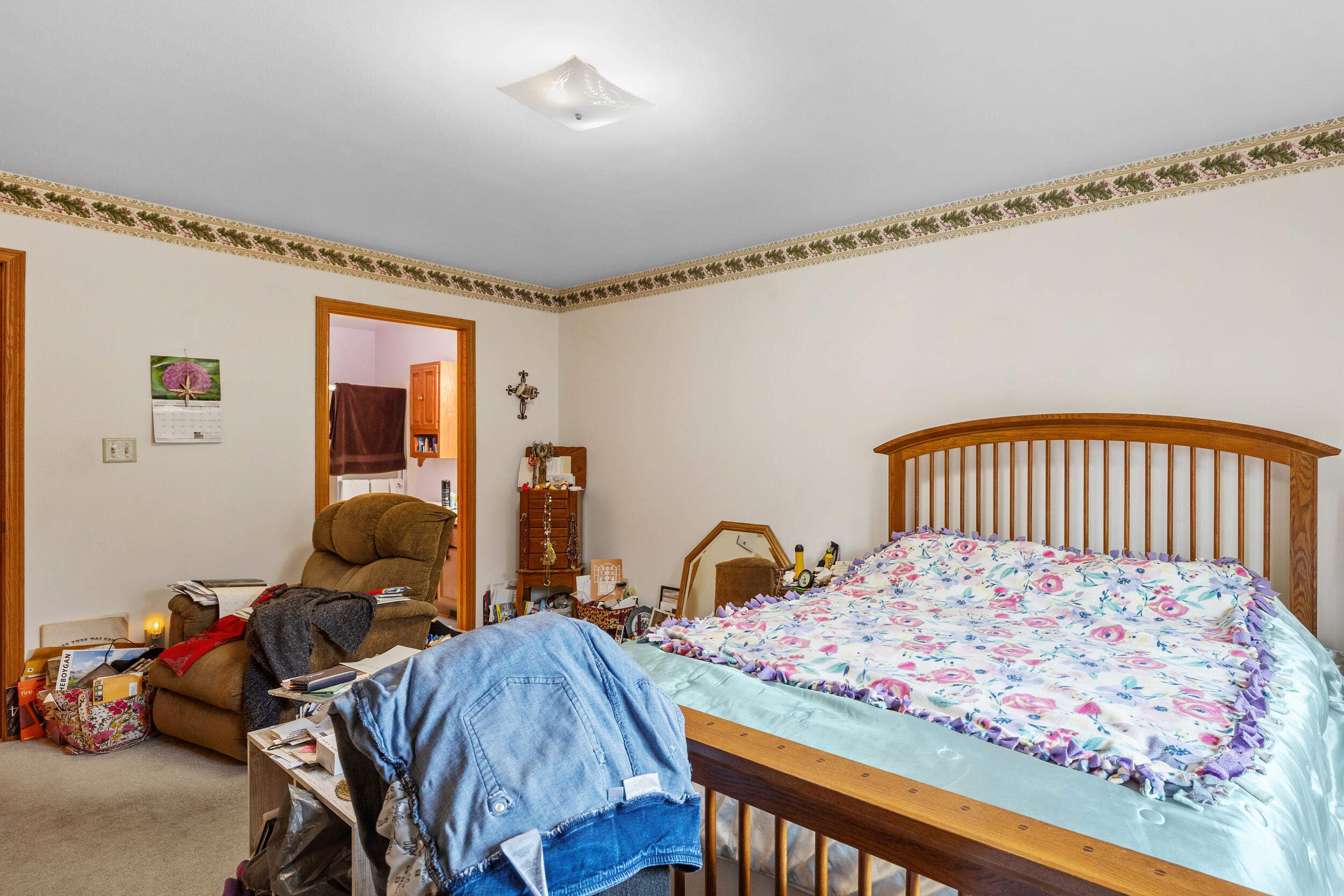 1105 Linden Street, Unit 1107 Cleveland, WI 53015 - Photo 9 of 47 1105 Master bedroom