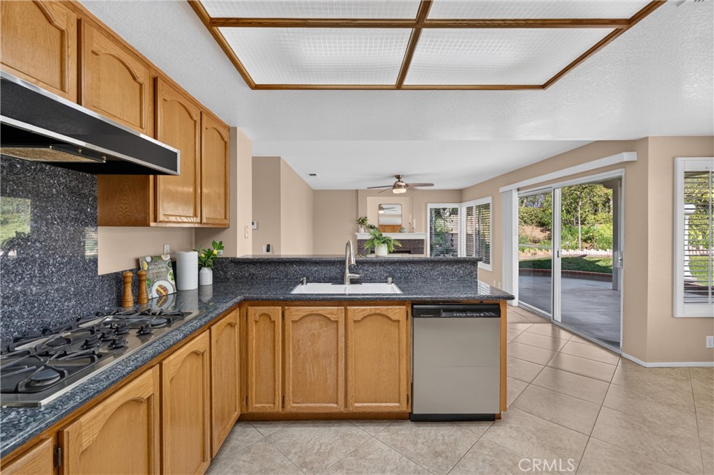 2000 Citrus Wood Lane Riverside, CA 92503 - Photo 15 of 51 Natural light fills the room while drawing your eye to the beautiful backyard and peaceful views.