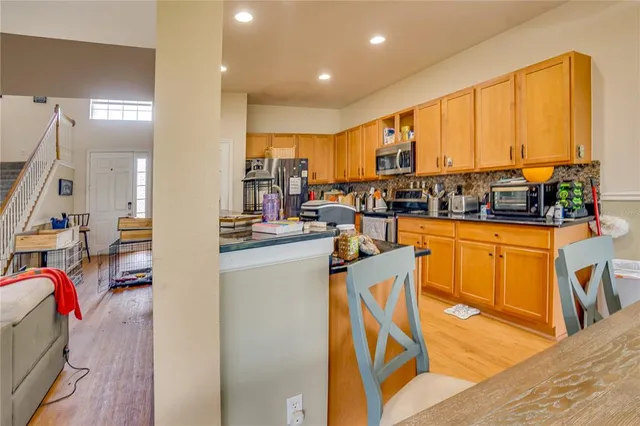 a view of a porch with seating space