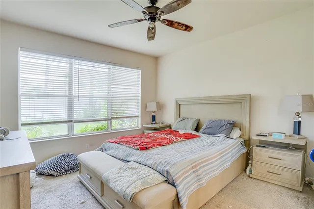 a bathroom with a tub and a window