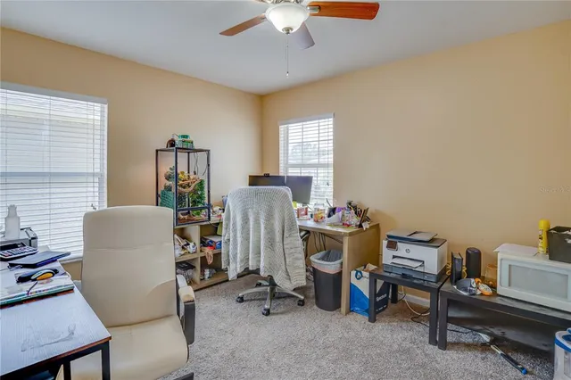 a room with toys and dresser
