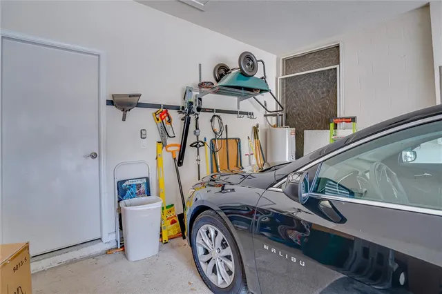 a view of a house with a yard and plants