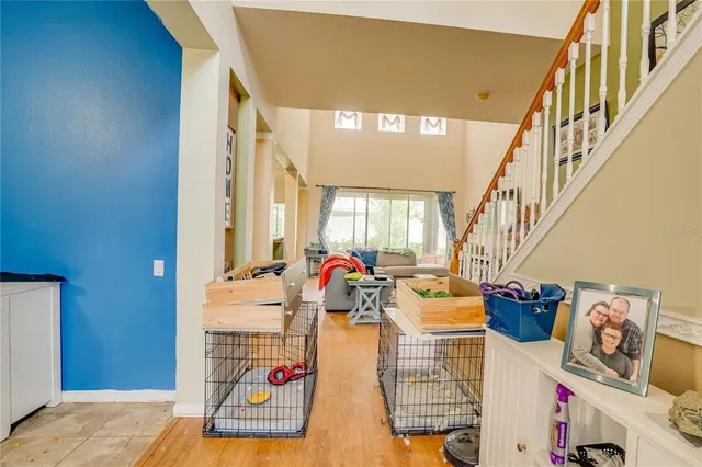 a living room with furniture and a window