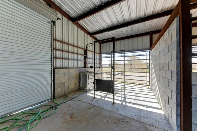 a view of a house with backyard and porch