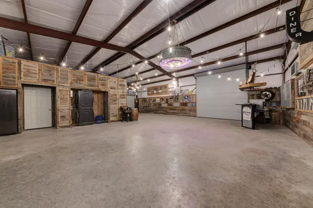 a view of parking garage with furniture