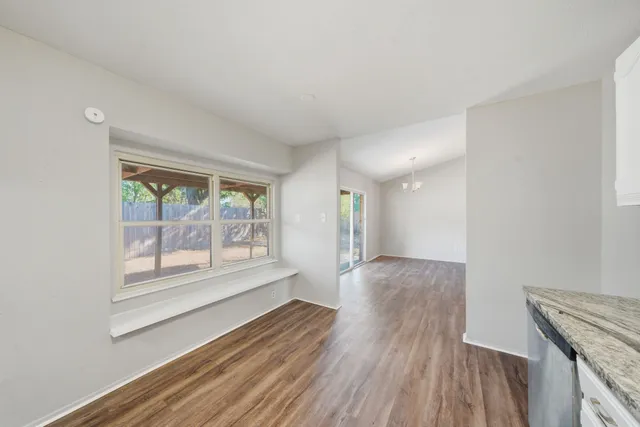 a view of livingroom with furniture and wooden floor