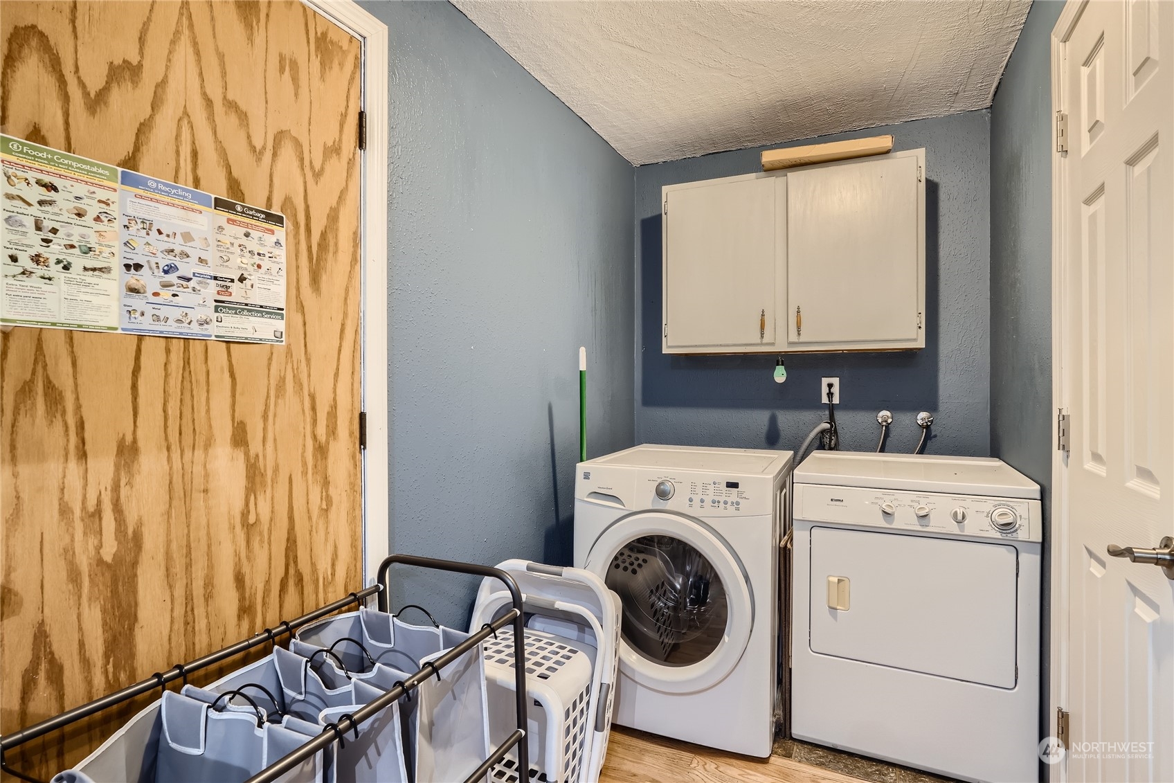 6935 24th Avenue Southwest Seattle, WA 98106 - Photo 22 of 27 a utility room with dryer and washer