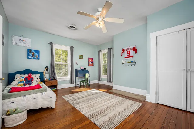 a swimming pool with some trees in the background