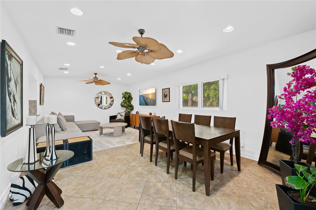 3301 Northeast 27th Avenue Lighthouse Point, FL 33064 - Photo 18 of 41 a view of a dining room and livingroom