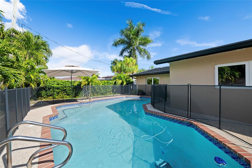 3301 Northeast 27th Avenue Lighthouse Point, FL 33064 - Photo 34 of 41 a view of a backyard