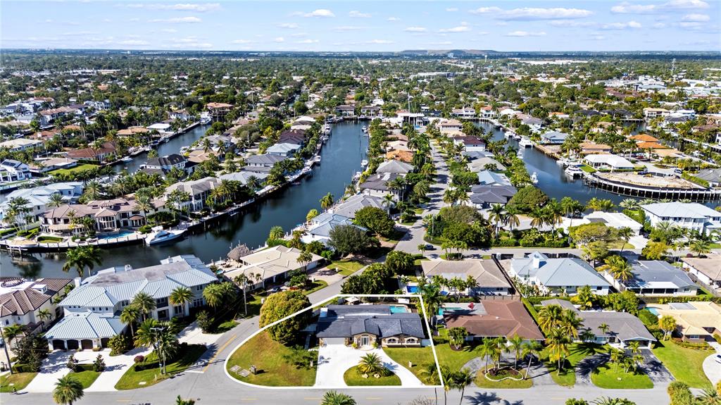 3301 Northeast 27th Avenue Lighthouse Point, FL 33064 - Photo 9 of 41 an aerial view of residential houses with outdoor space