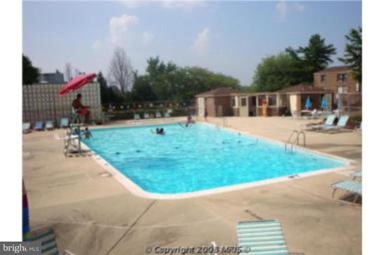 3230 Spartan Road, Unit 67 Olney, MD 20832 - Photo 2 of 11 a front view of a house with garden