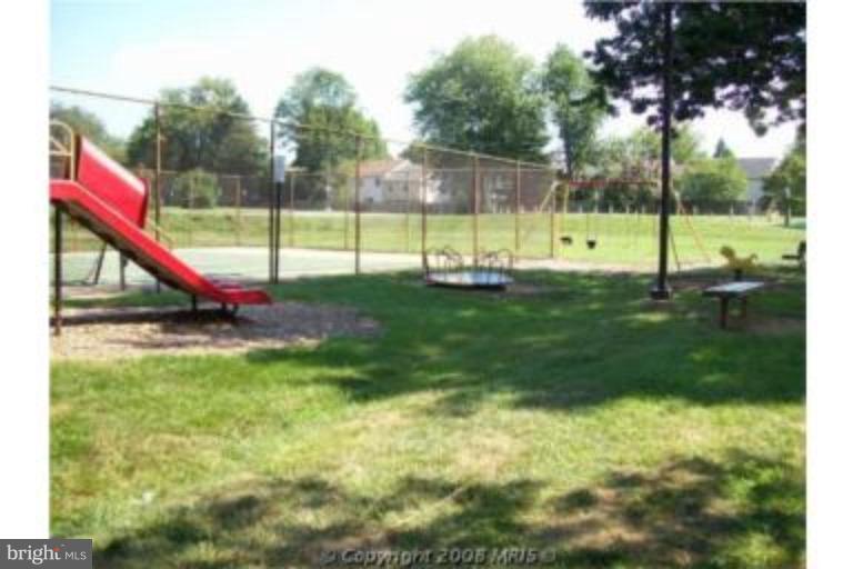 3230 Spartan Road, Unit 67 Olney, MD 20832 - Photo 3 of 11 a view of a park with a slide