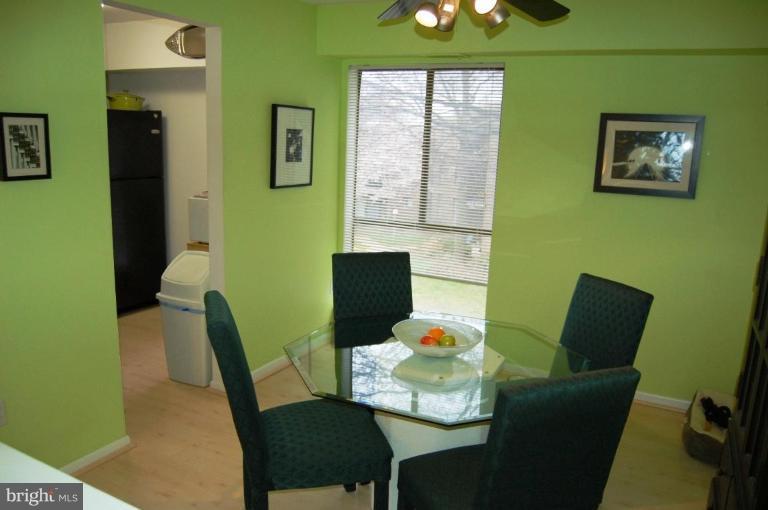 3230 Spartan Road, Unit 67 Olney, MD 20832 - Photo 5 of 11 a dining room with furniture and window