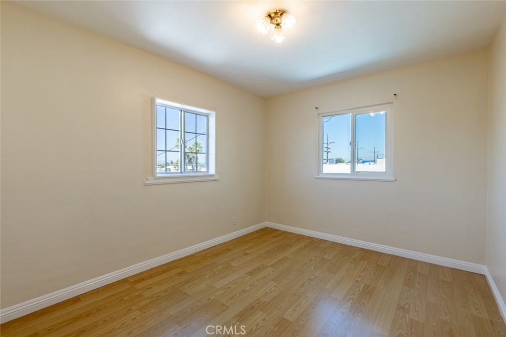 6623 San Fernando Road, Unit A Glendale, CA 91201 - Photo 13 of 33 a view of a room with wooden floor and windows