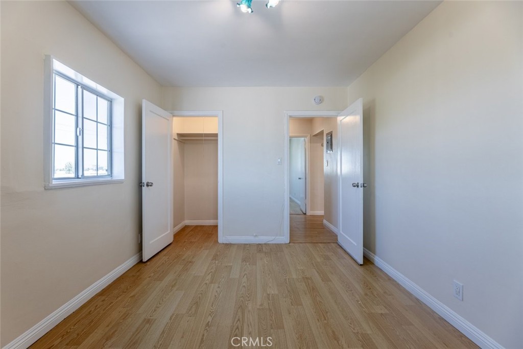 6623 San Fernando Road, Unit A Glendale, CA 91201 - Photo 14 of 33 an empty room with wooden floor and windows