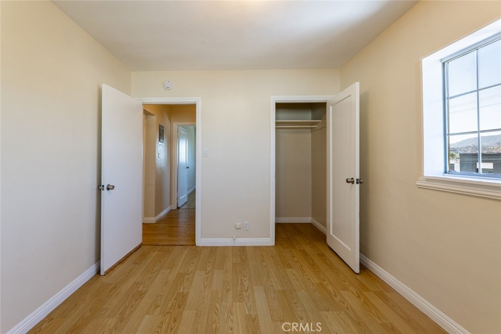 6623 San Fernando Road, Unit A Glendale, CA 91201 - Photo 15 of 33 an empty room with wooden floor and windows