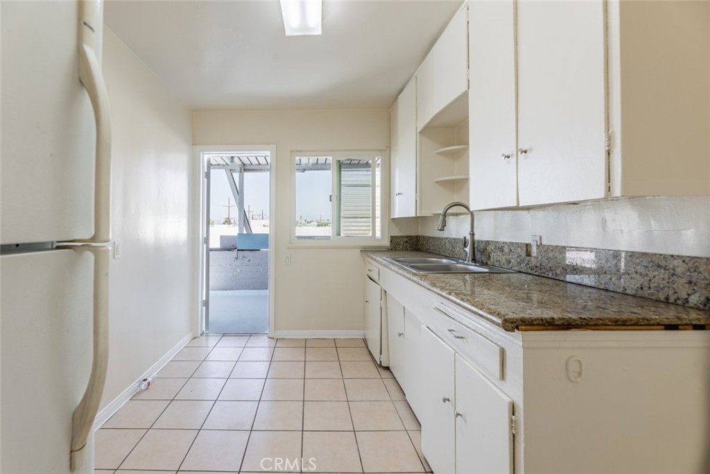 6623 San Fernando Road, Unit A Glendale, CA 91201 - Photo 16 of 33 a kitchen with a sink appliances and cabinets