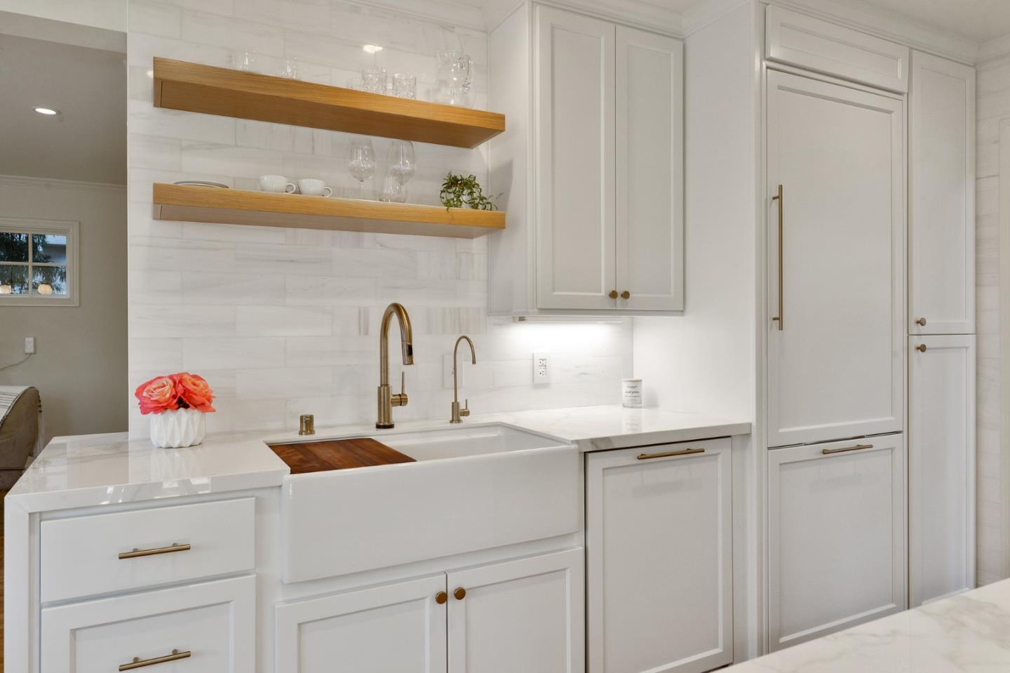 751 Partridge Avenue Menlo Park, CA 94025 - Photo 12 of 37 a kitchen with a sink and cabinets